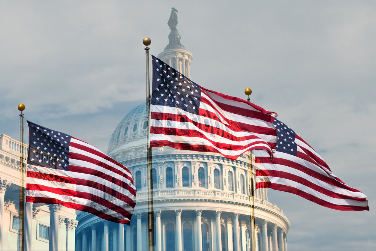 Capitol building with flags